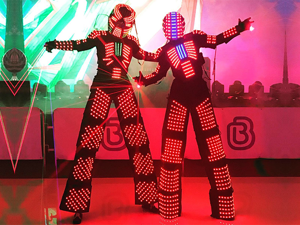 LED Robots dance at events